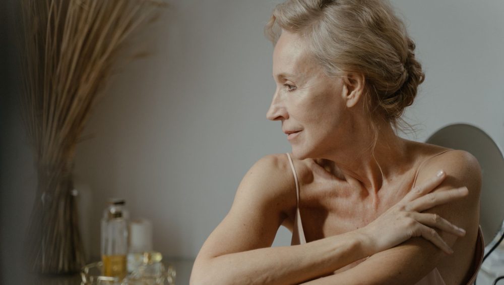 Woman in her fifties in natural light, relaxed and unretouched