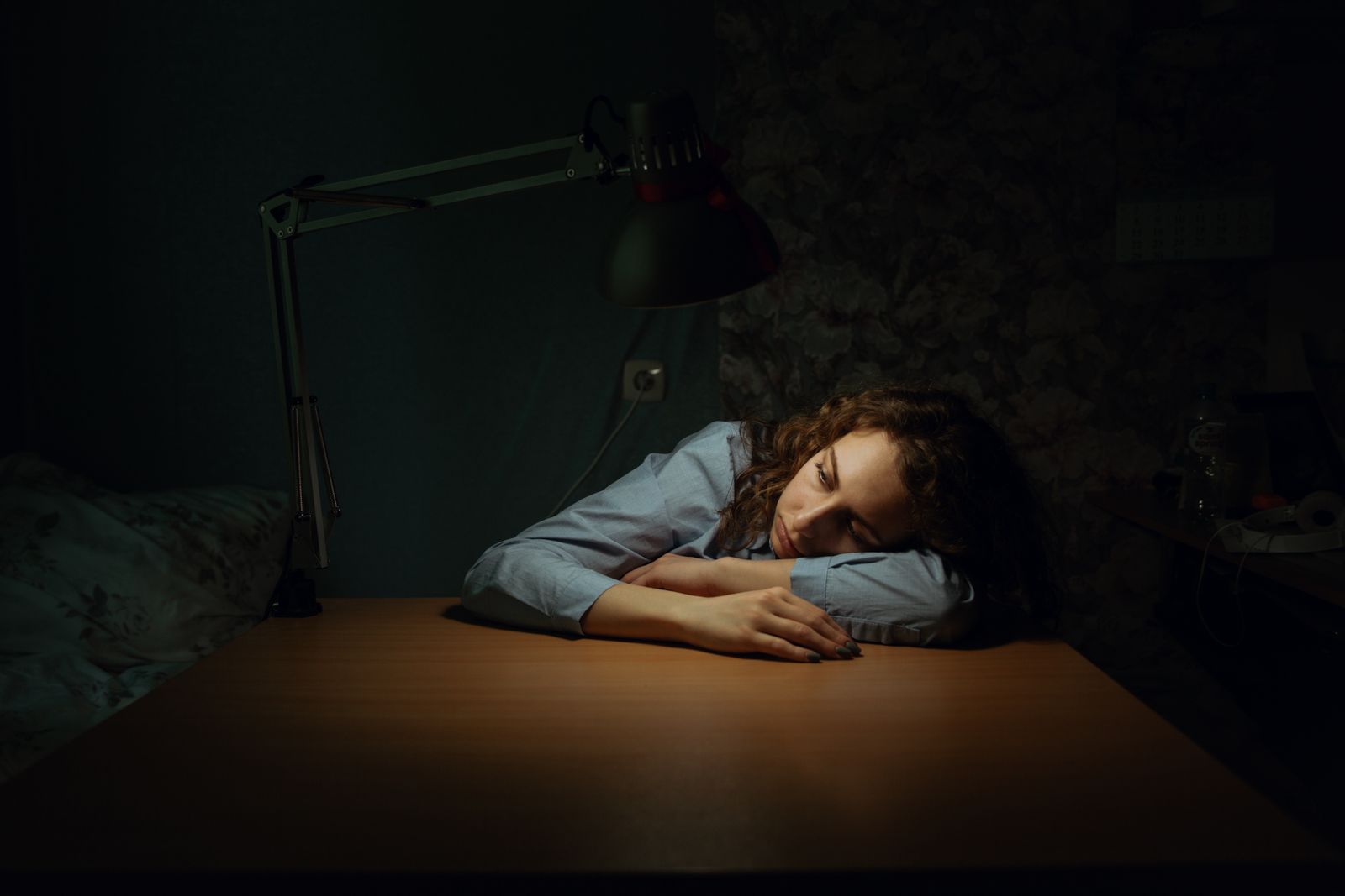 Woman resting in a dimly lit room