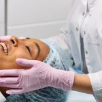 A client receiving a professional facial treatment