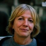 Mature woman with short blonde hair in natural light