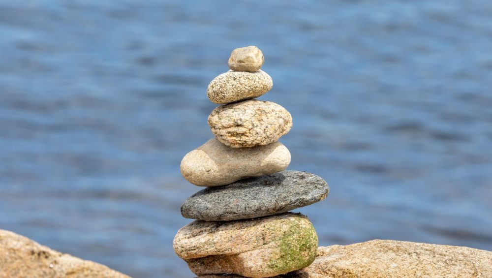 Balanced stack of stones by the sea