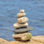 Balanced stack of stones by the sea