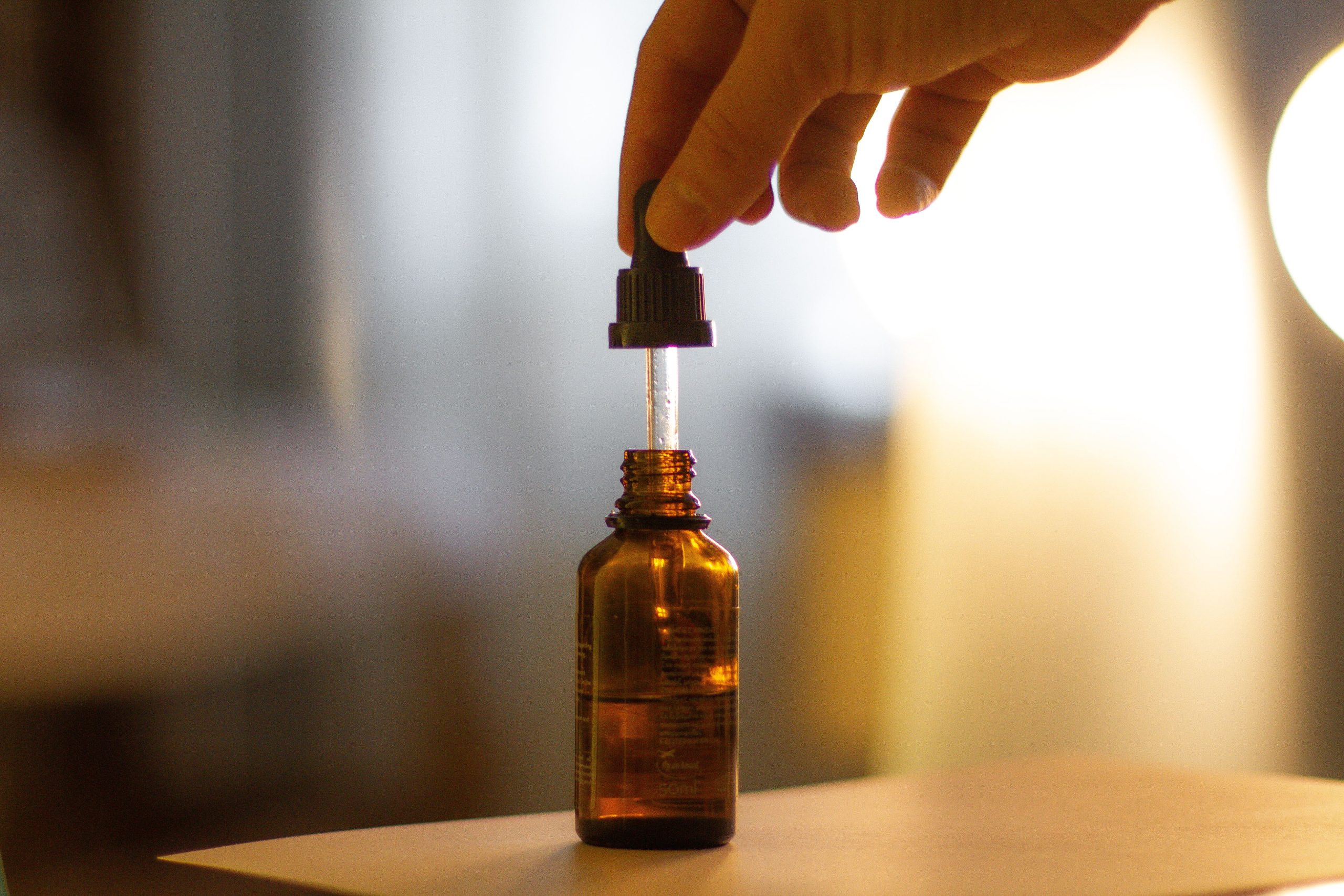 Dropper and bottle containing vitamin C serum